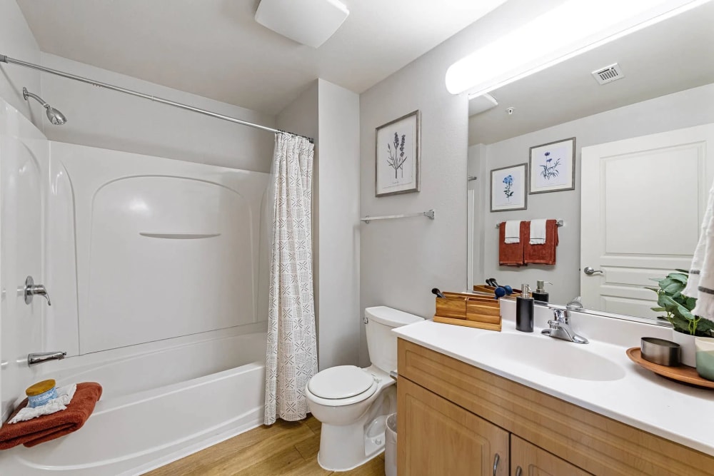 Bathroom with oversized vanity and tub/shower at K Street Flats in Berkeley, California