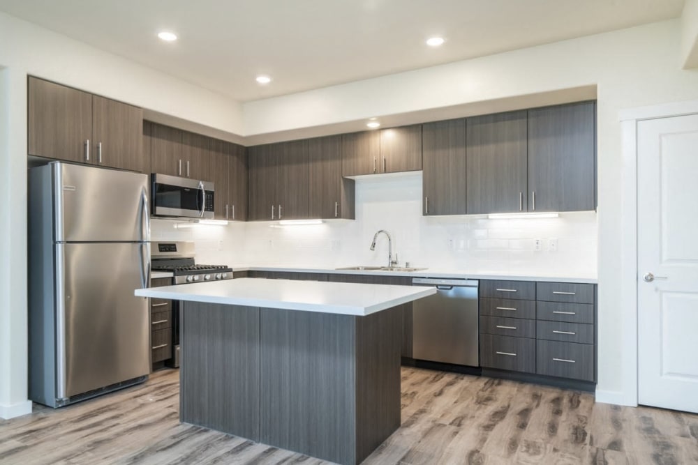 Kitchen with appliances at Hub Apartments in Folsom, California