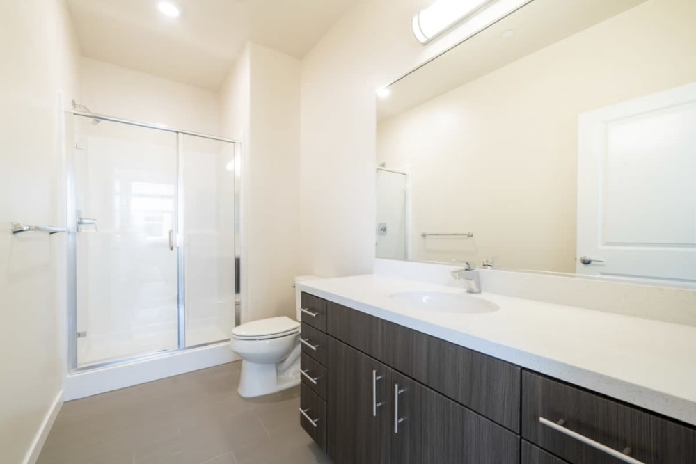 Bathroom with a large counter at Hub Apartments in Folsom, California