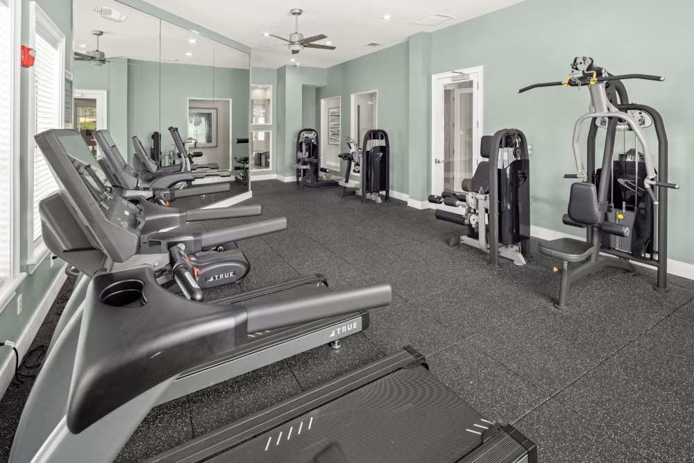 Resident fitness center with cardio equipment at Pointe Parc at Avalon in Orlando, Florida