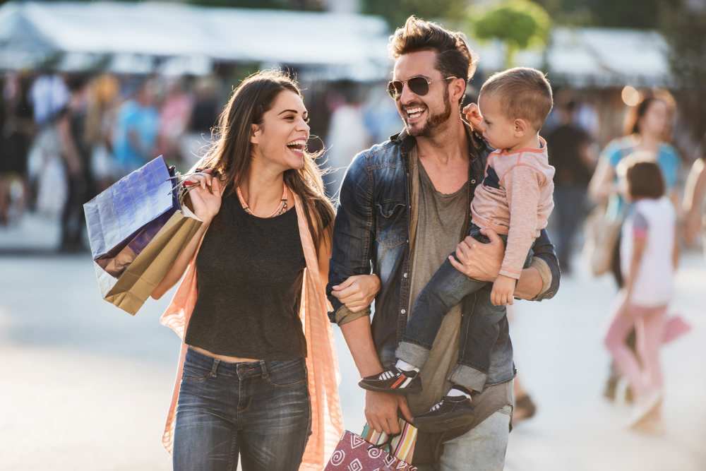 Young family shopping near Waters Pointe in South Pasadena, Florida