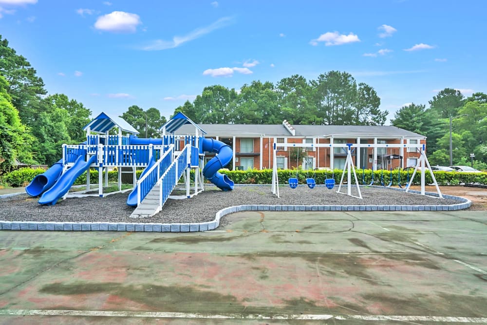 The on-site playground and swings at Residence at Riverside in Austell, Georgia