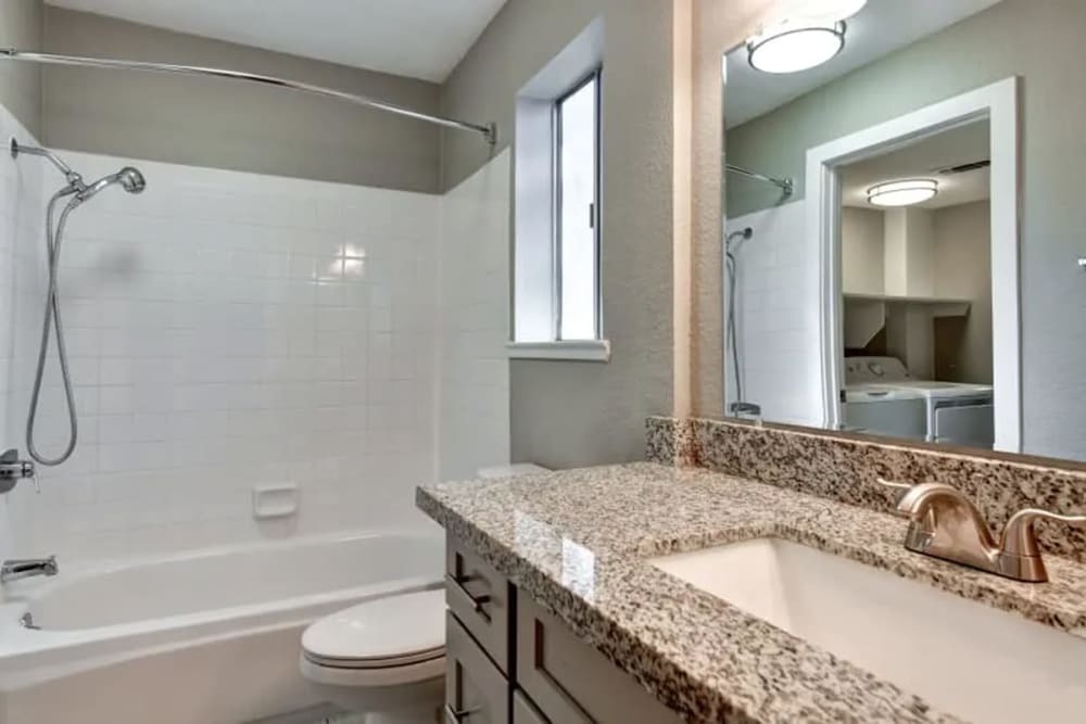 Bathroom with a large counter at Creekside Gardens in Vacaville, California