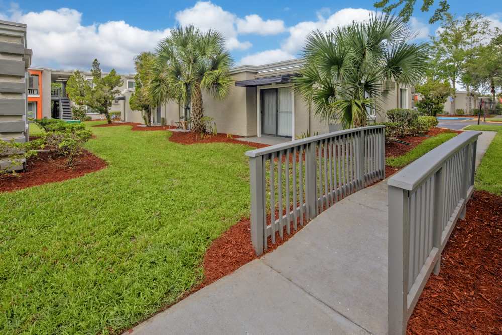 Walkways and gardens at Windward Apartments in Orlando, Florida