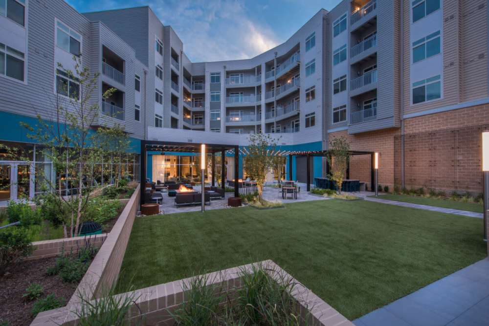 Outdoor courtyard with firepits at The Daley at Shady Grove Metro in Rockville, Maryland