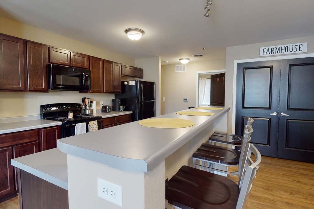 Kitchen with plenty of counterspace at The Quarters at Ames in Ames, Iowa