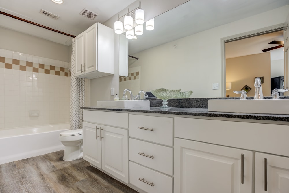 Bathroom with tub at Sonterra Heights in San Antonio, Texas