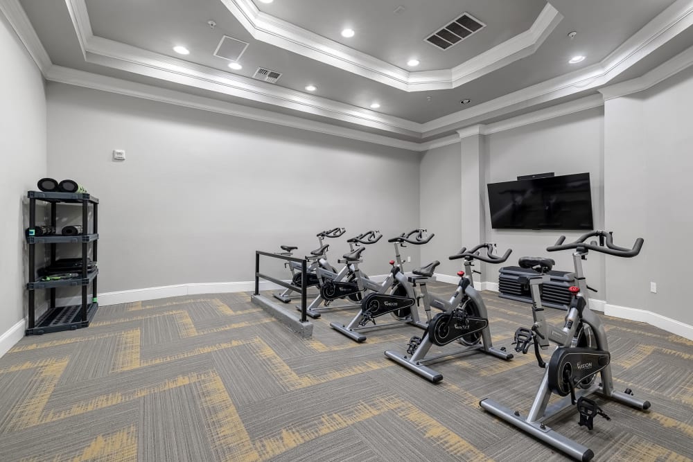 Spacious fitness room with cardio machines at Marquis at Waterview in Richardson, Texas
