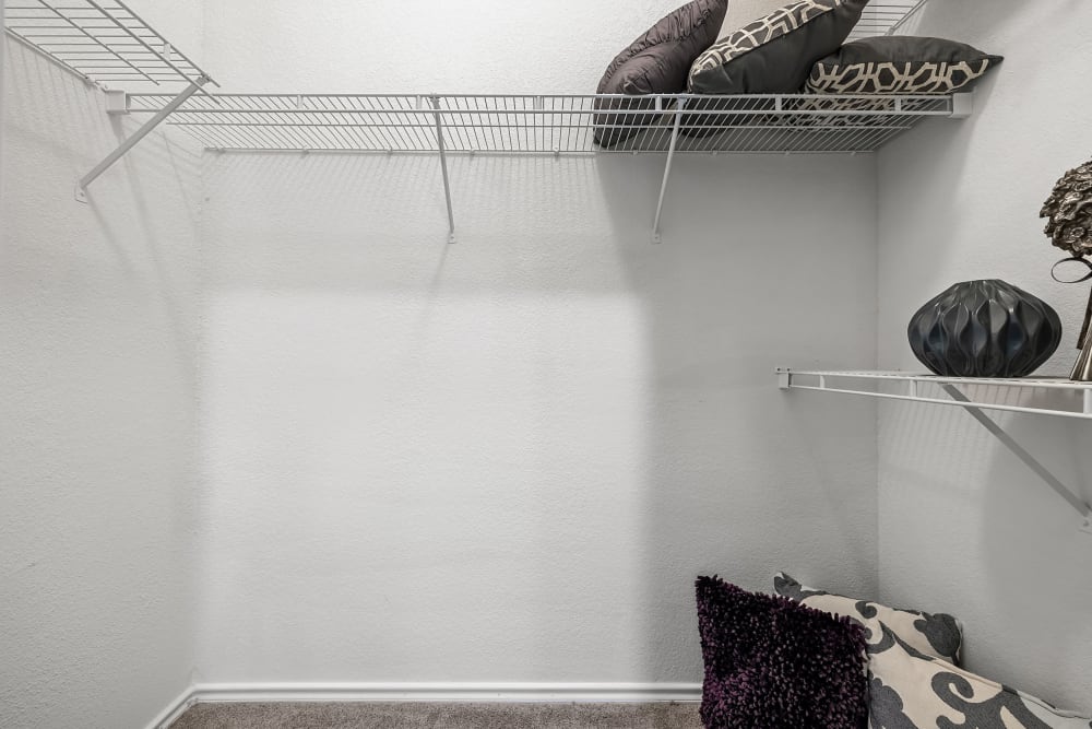 Full size walk-in closet at Marquis at Waterview in Richardson, Texas