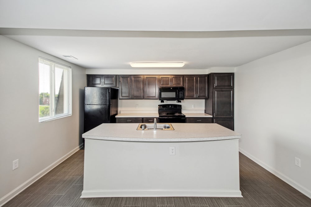 Elegant white kitchen at Midtown at Coppin Heights in Baltimore, Maryland