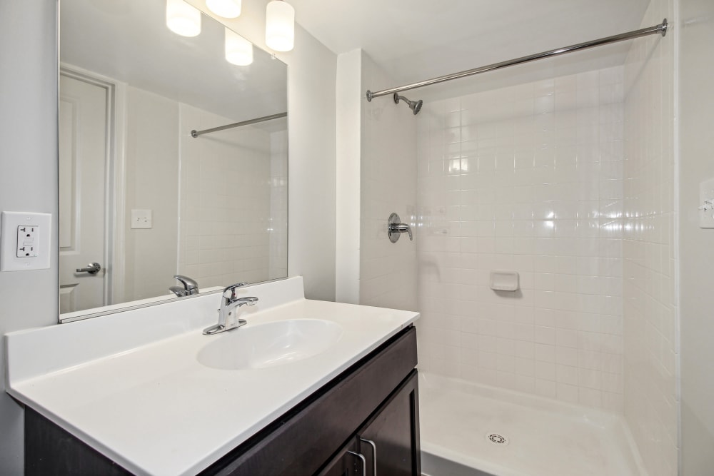 Elegant White bathroom at Midtown at Coppin Heights in Baltimore, Maryland
