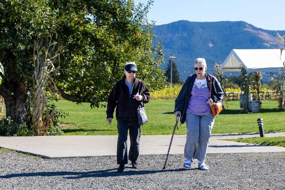 Two elderly woman walking at Cherry Park Plaza in Troutdale, Oregon