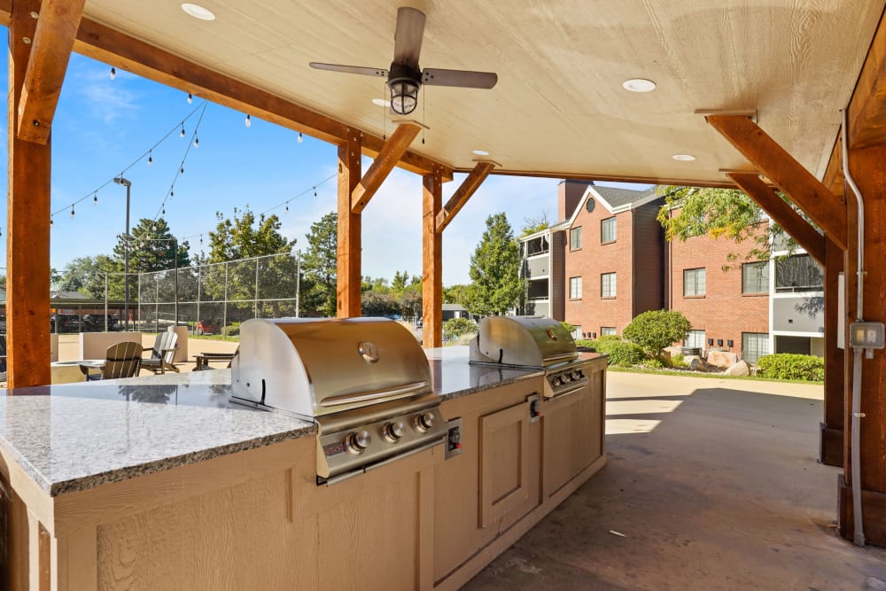 Covered BBQ at Sports Court at Royal Ridge Apartments in Midvale, Utah