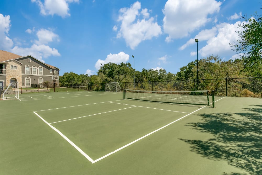 Corner view of tennis court at The Anthony at Canyon Springs in San Antonio, Texas