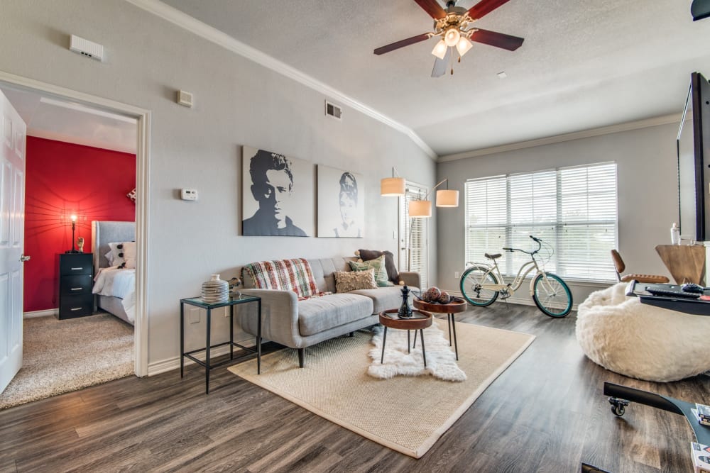 Model living space with ceiling fan at The Anthony at Canyon Springs in San Antonio, Texas
