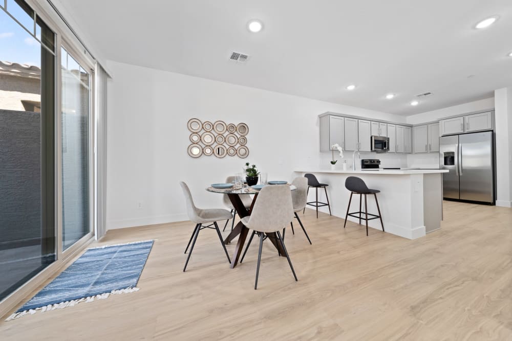 Beautiful open-concept floor plan with hardwood floors in a model home at Sierra Verde in Surprise, Arizona