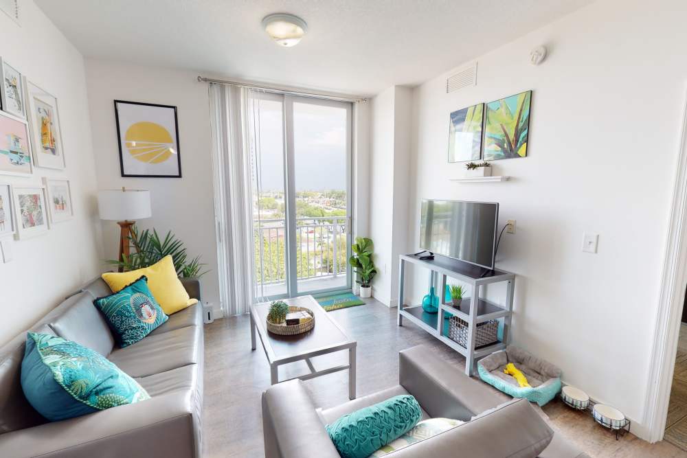 Apartment living room with leather sofa at 109 Tower in Miami, Florida