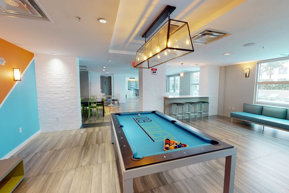 Resident clubhouse with billiards at 109 Tower in Miami, Florida