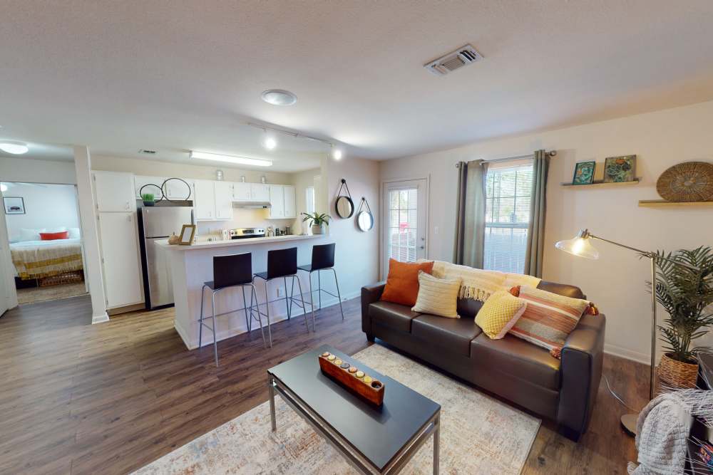 Open concept floor plan with hardwood floors at The Quarters at Lincoln in Lincoln, Nebraska