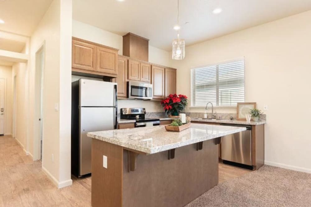 Kitchen with island at Wisdom Place in Modesto, California