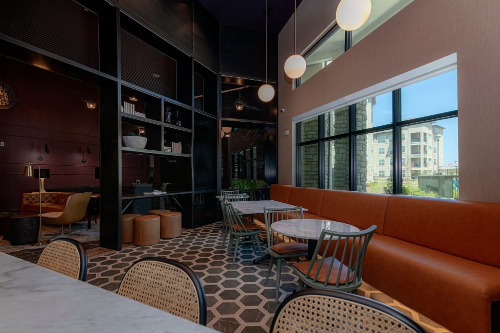 Elegant tables and leather chairs at Auro Crossing in Austin, Texas