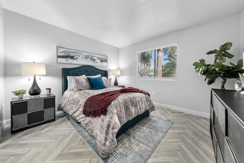 Model bedroom with soft carpet at District 5800 in Las Vegas, Nevada