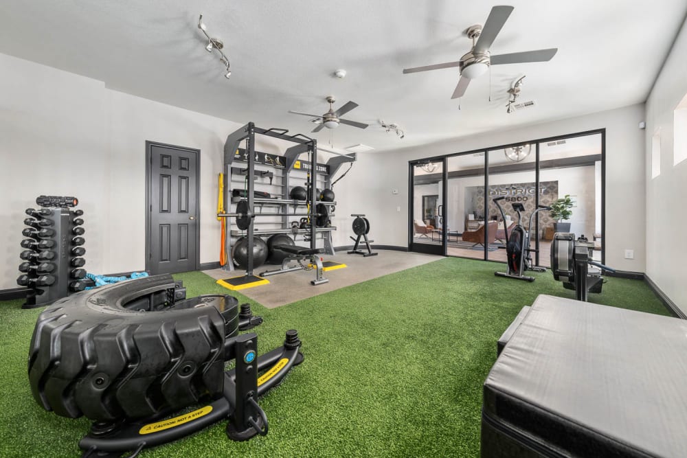 Modern gym fitness room with large windows at District 5800 in Las Vegas, Nevada