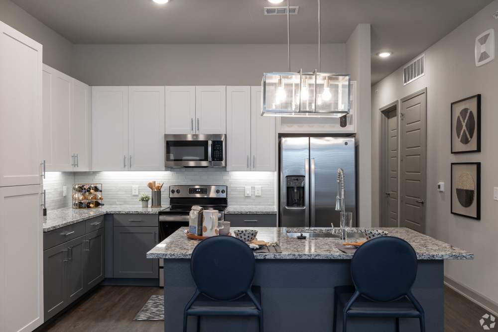 Open kitchen concept at The Reserve at Woodland Lakes in Conroe, Texas