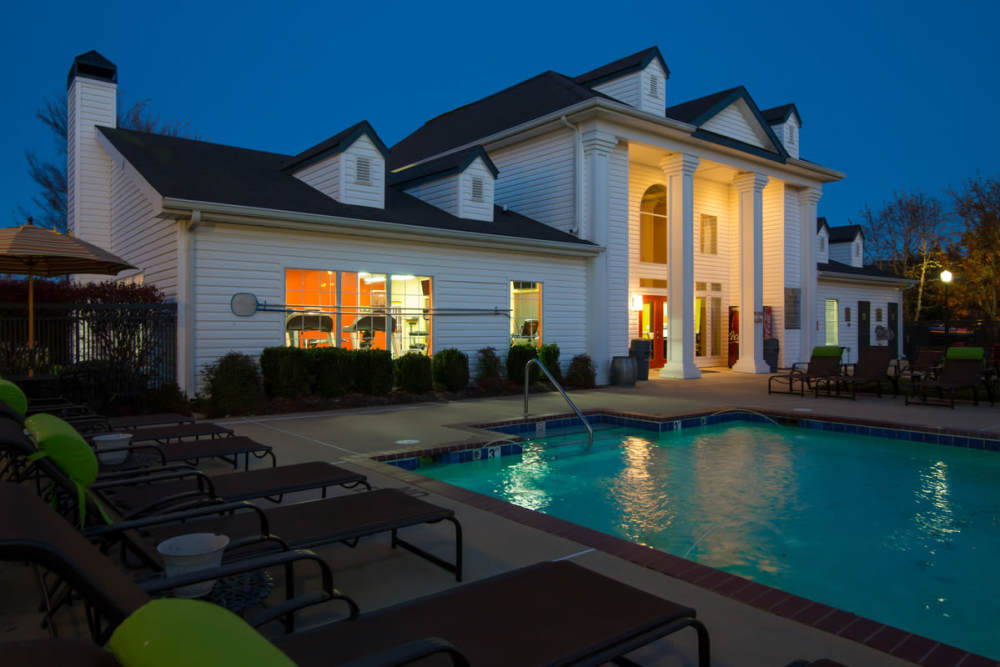 Community pool at dusk at The Landing at Fayetteville in Fayetteville, Arkansas