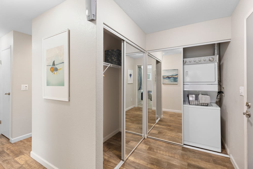 Entryway with washer and dryer at Sofi at Somerset in Bellevue, Washington