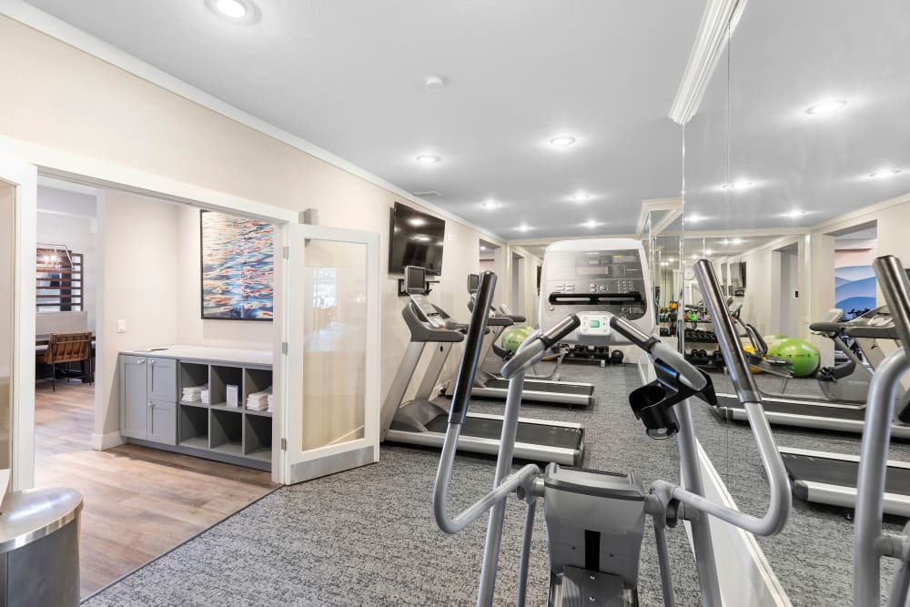 Fitness center with equipment at Sofi at Somerset in Bellevue, Washington