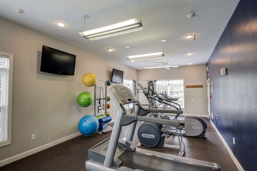 Fitness center at Park at Winterset Apartments in Owings Mills, Maryland features a variety of workout options.