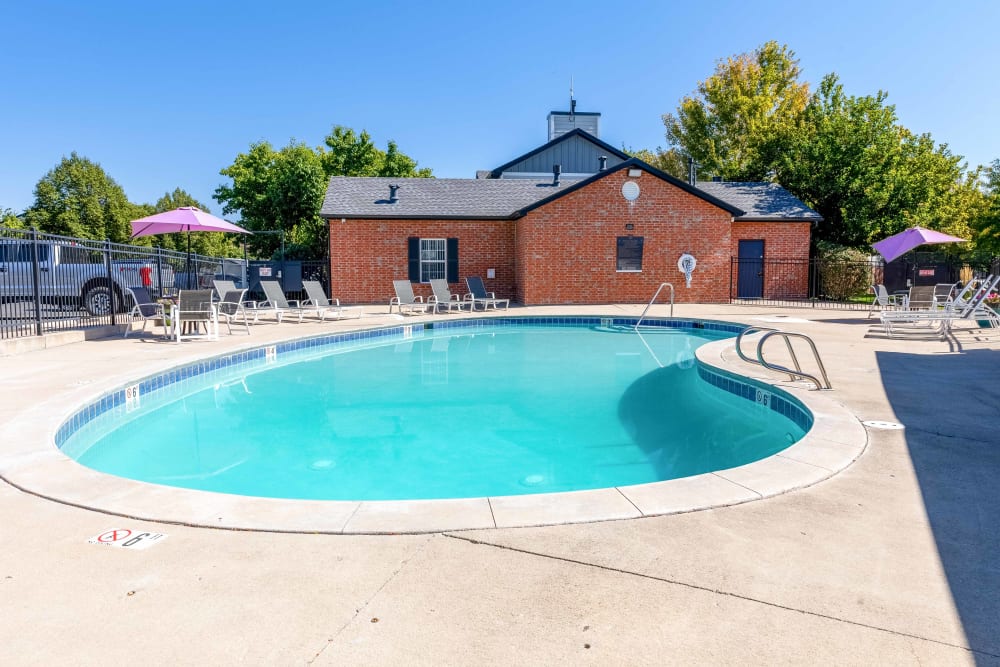 Community Pool and clubhouse exterior at Country Ranch Apartments in Fort Collins, Colorado