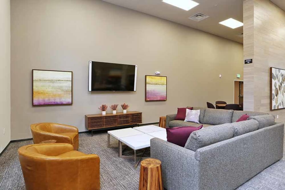 Clubhouse seating with TV at Cedar Pointe in Arlington, Washington
