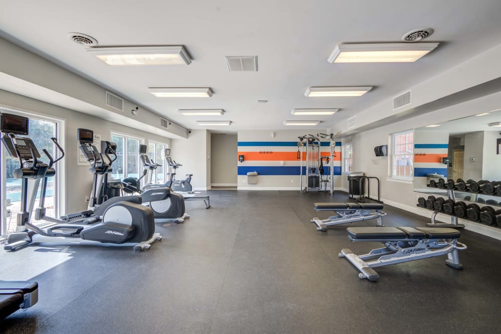 Fitness center featuring a variety of modern exercise equipment at Maple Bay Townhomes in Virginia Beach, Virginia