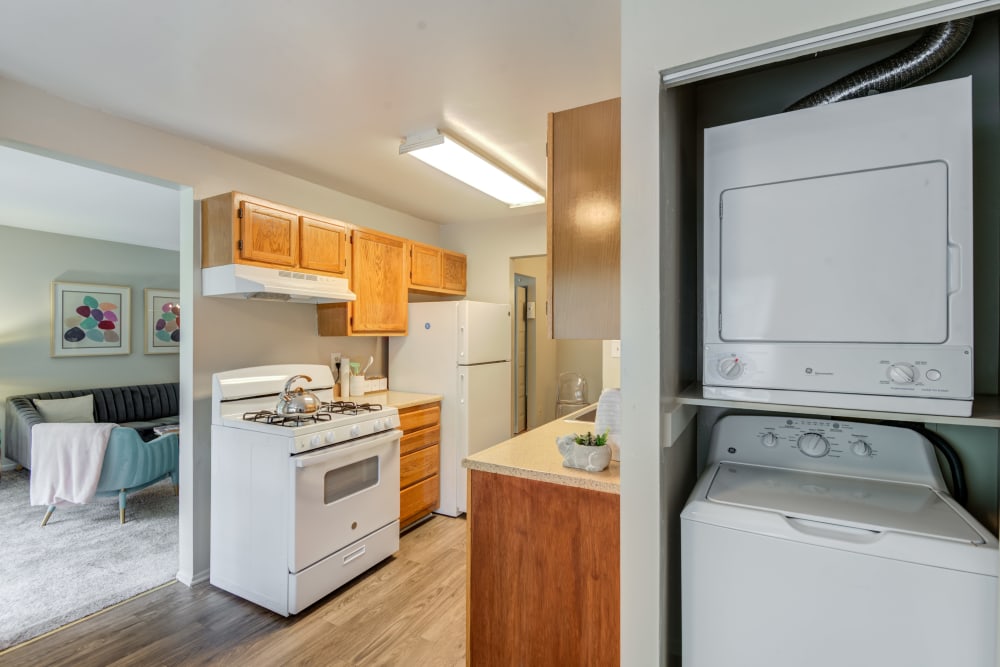 Beautiful Apartments with a Kitchen and washer dryer utility closet at The Timbers at Long Reach Apartments