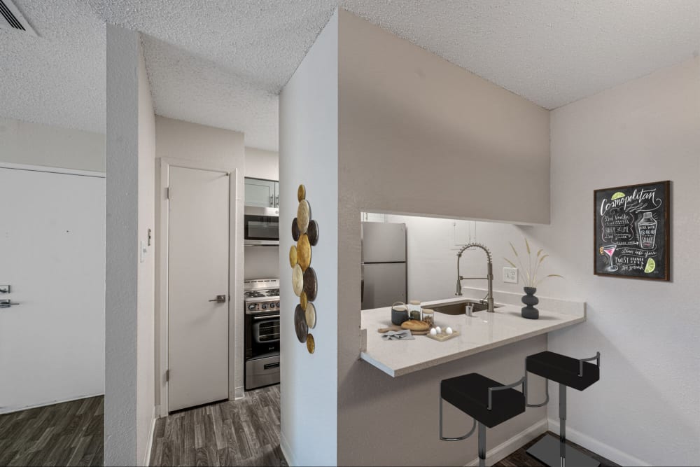 Resident kitchen breakfast bar at Pinewood Estates in Albuquerque, New Mexico