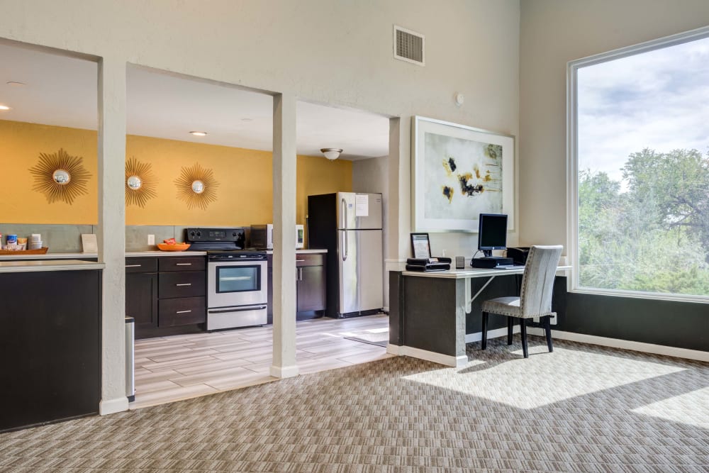 Business center and community kitchen area at The Knolls at Sweetgrass Apartment Homes in Colorado Springs, Colorado
