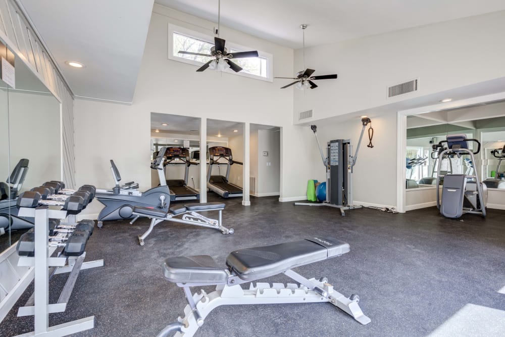 Fitness Center at The Knolls at Sweetgrass Apartment Homes in Colorado Springs, Colorado  features a variety of workout equipment.