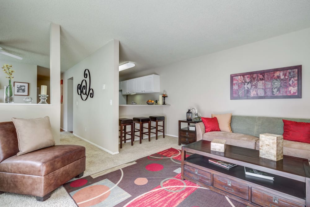 The Knolls at Sweetgrass Apartment Homes offers a Living Room in Colorado Springs, Colorado