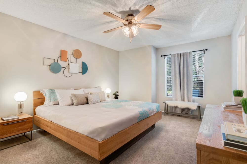Large master bedroom with plush carpeting at Landmark at Barton Creek in Austin, Texas