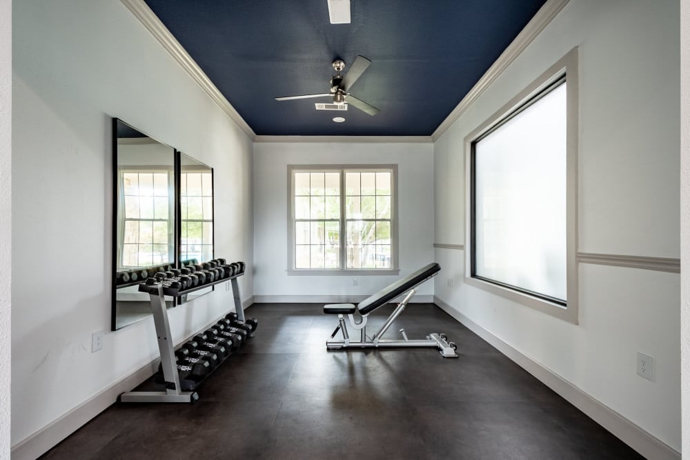 Fitness Center with free weights at Mission Ranch in Mesquite, Texas