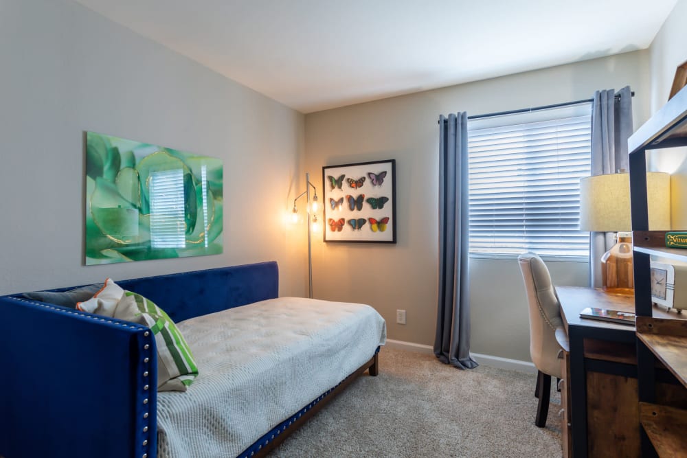 Luxurious and spacious bedroom with access to natural lighting at Jackson Grove Apartment Homes in Hermitage, Tennessee
