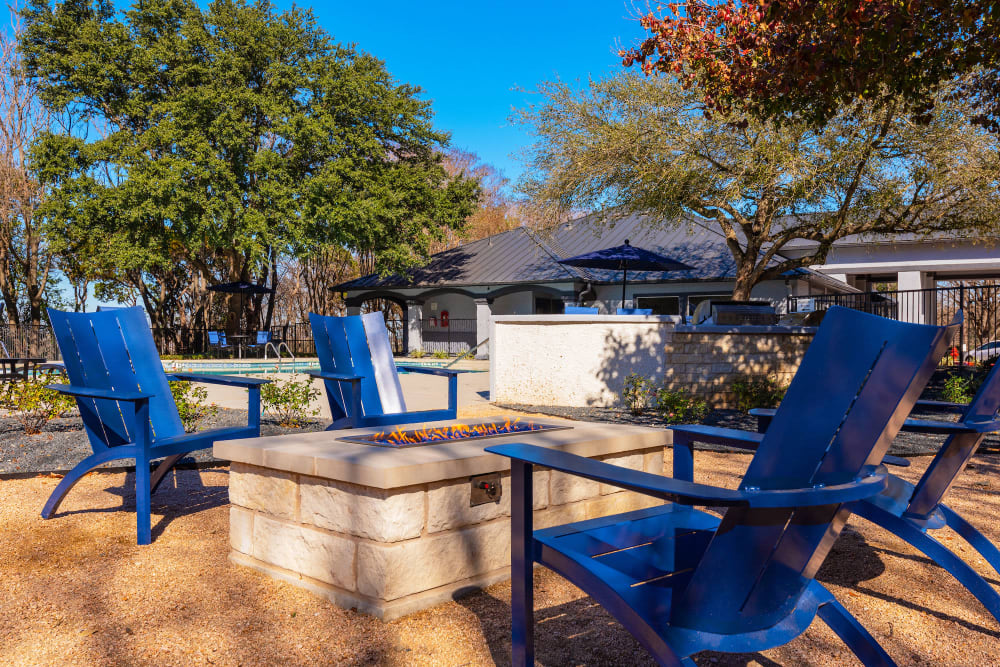 Community spaces with a firepit at Ellie Apartments in Austin, Texas