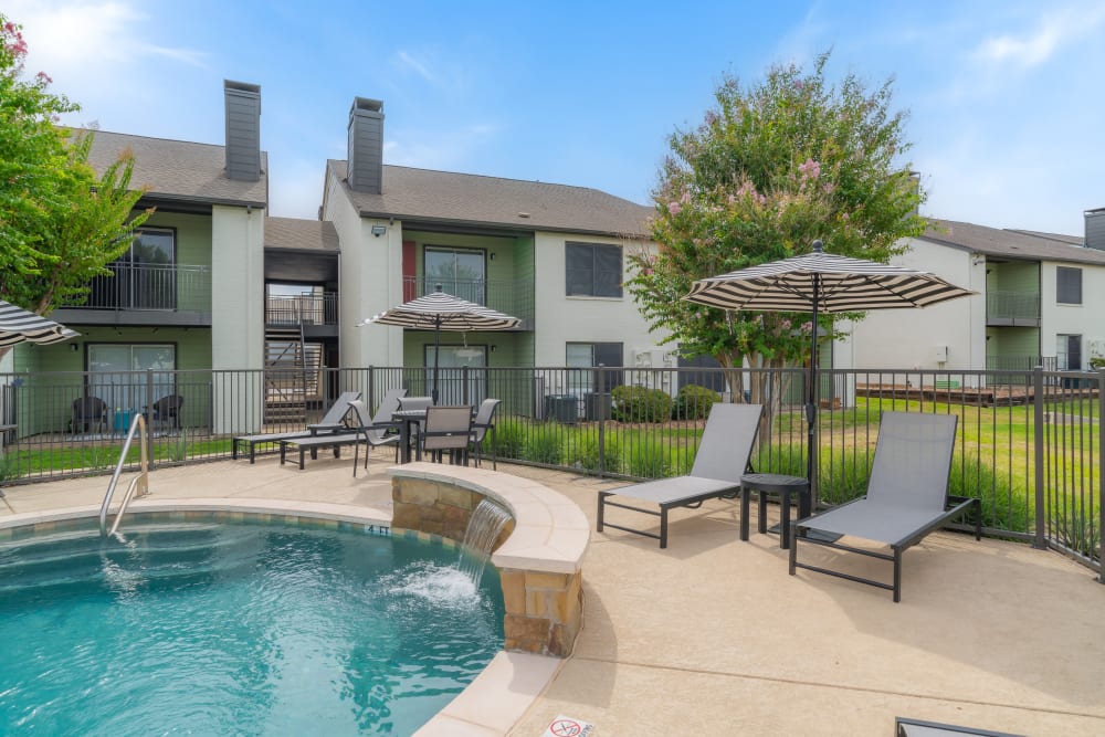 Sparkling pool  at Leander Apartment Homes in Benbrook, Texas