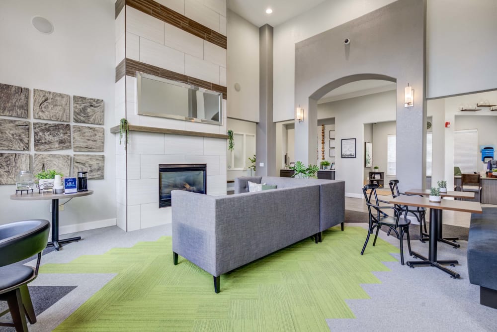 Fireside sitting area inside leasing office at Reserve at South Creek in Englewood, Colorado