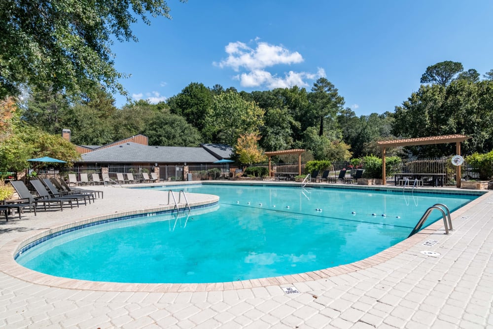 Community outdoor pool at The Lodge on the Chattahoochee Apartments in Sandy Springs, Georgia