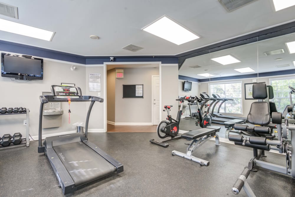Treadmill, free weights, and other exercise equipment in the fitness center at Hunter's Glen in Upper Marlboro, Maryland