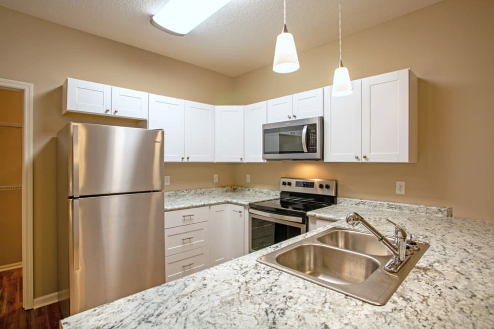 Kitchen with granite counters at Patriots Place in Valdosta, Georgia