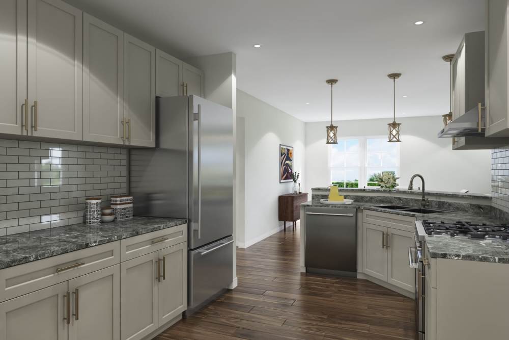Kitchen and living space in a model home at Patriots Place in Valdosta, Georgia